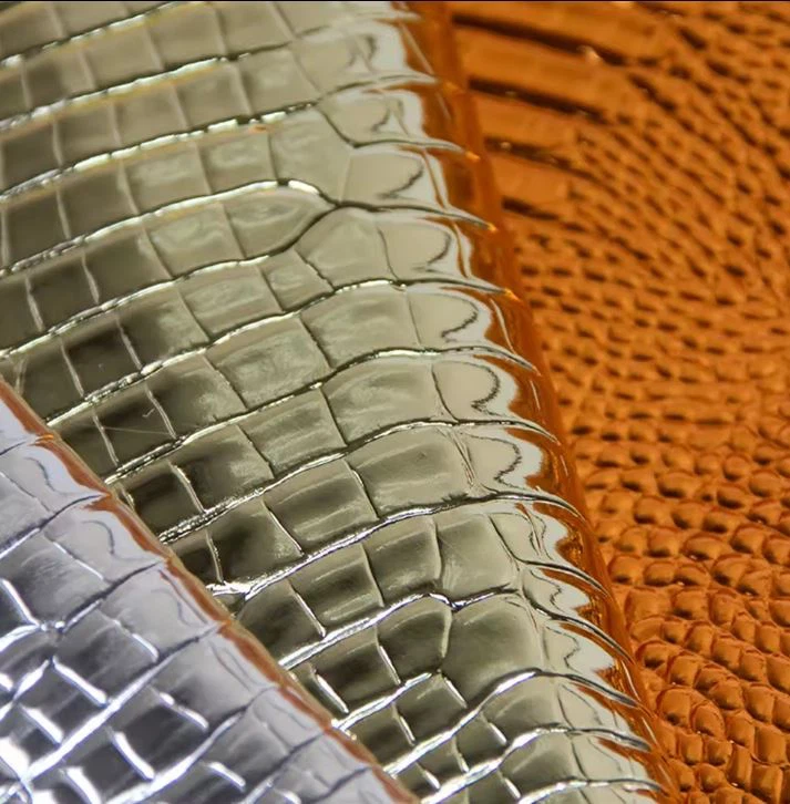 Wholesale Embossing Crocodile PVC Synthetic Leather Fabric Metal Plain Faux Rolls Material For Bags Shoes